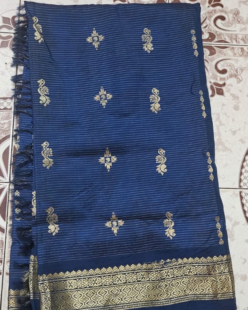 Navy blue silk saree with gold zari butta and temple border