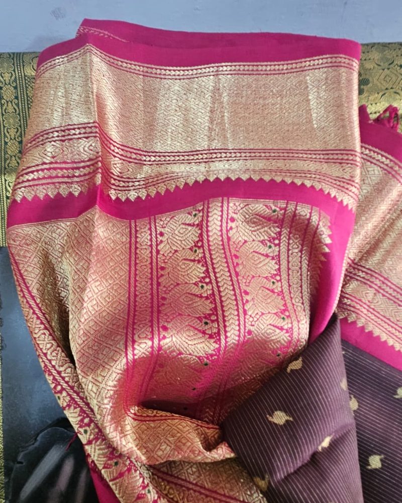 Magenta pattu saree pallu with rich gold zari work